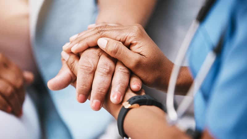 Healthcare staff supporting patient communication and administrative workflow